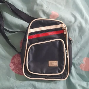 Сумка-барсетка унісекс темно-синя у смужки