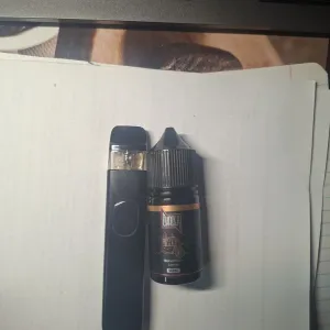 Vaporesso XROS 5 с новым картриджем и жидкостью